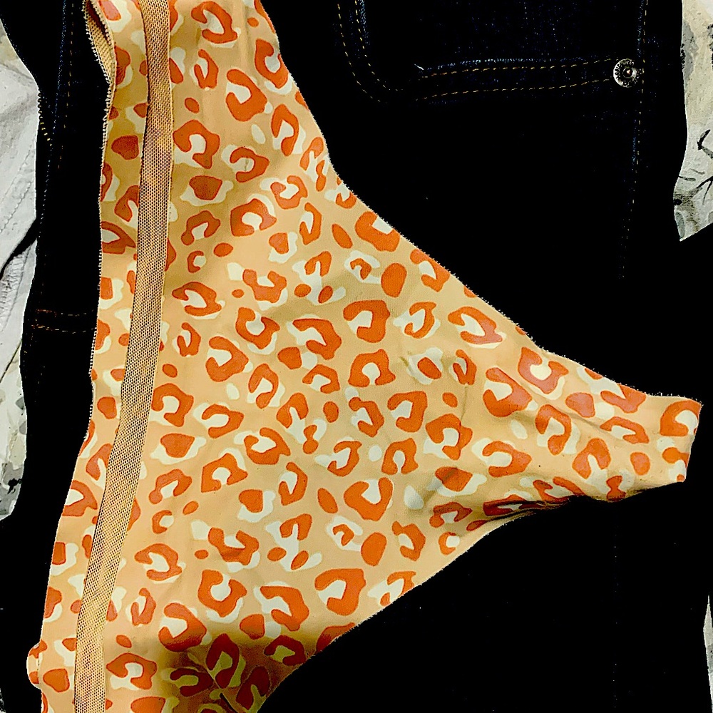 Thong panties, leopard and new. To large for me. Pink. Size medium